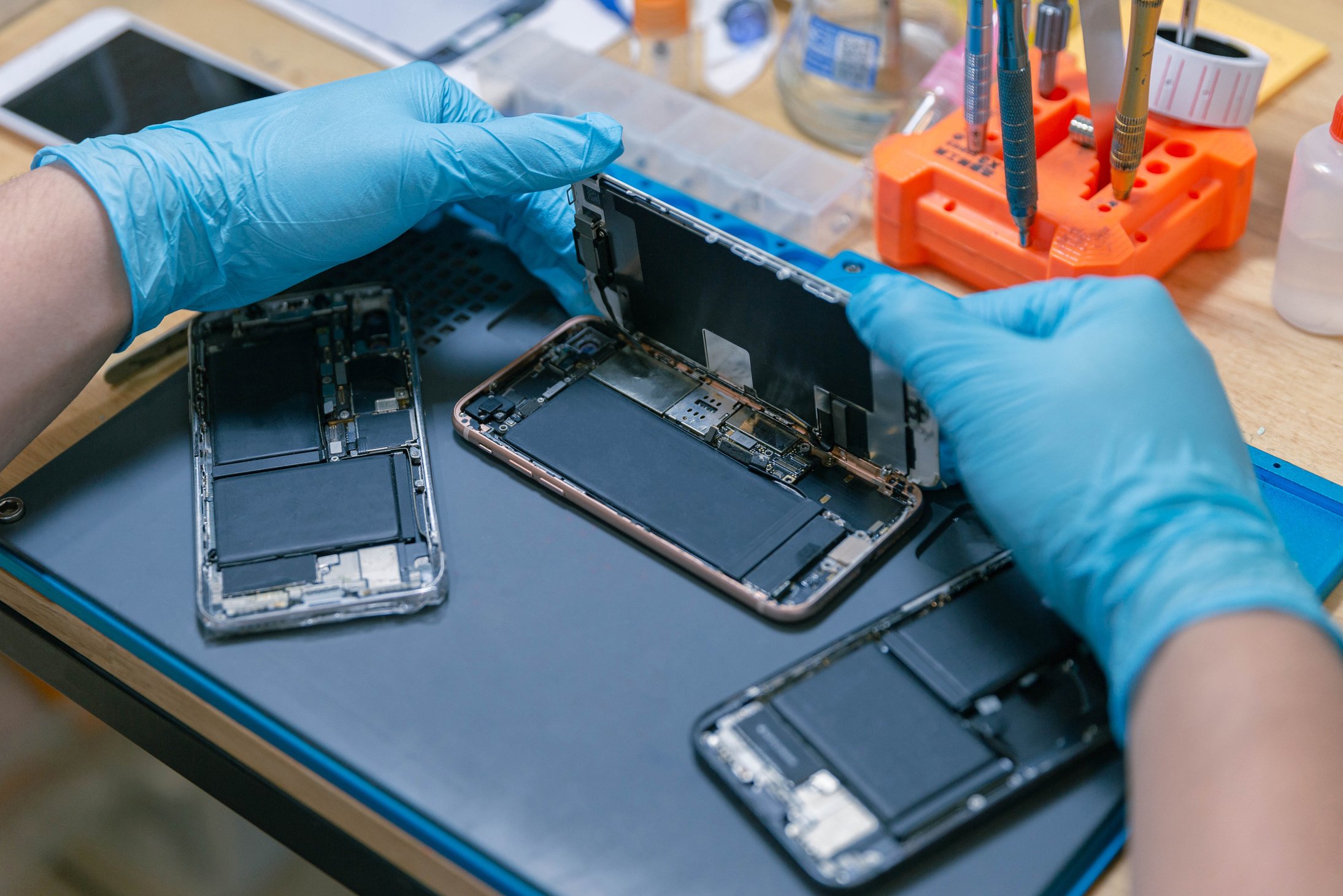 Phone Repair Concept a Mobile Phone Being Assembled by the Repai